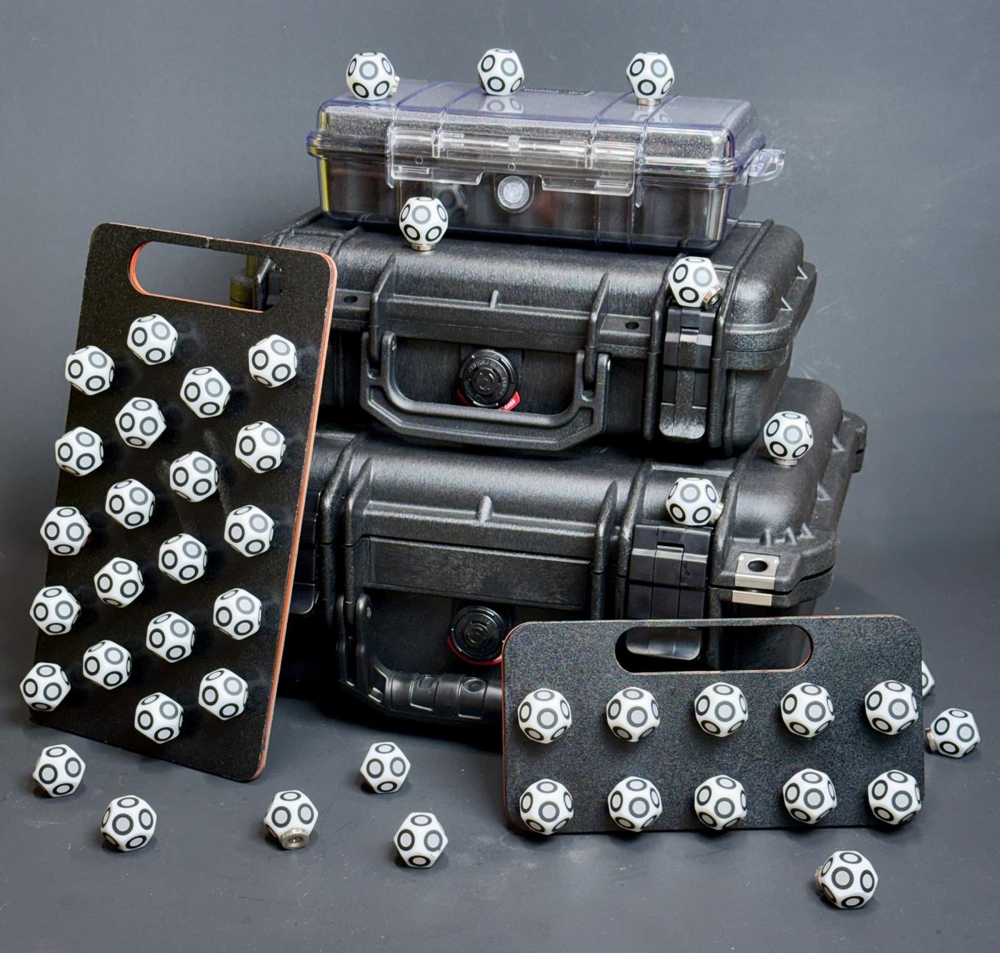 The 6 mm case lineup stacked, with two deployment trays out of their cases and loaded with dice